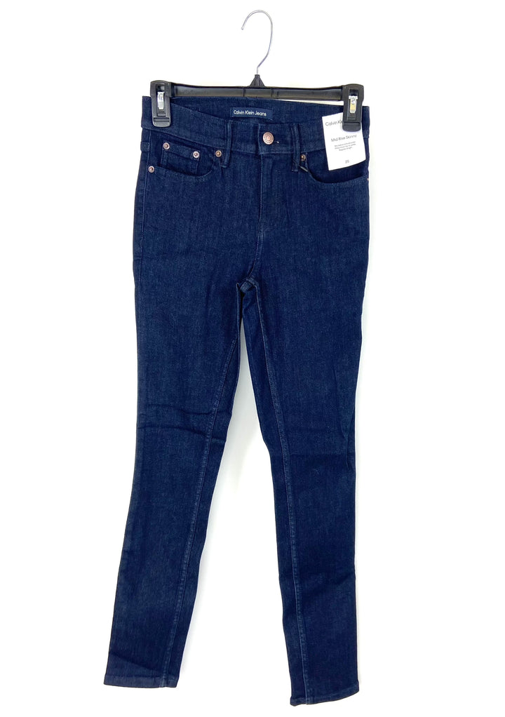 Dark Wash Mid Rise Skinny Jean - 25, 26, 27, 28, 29