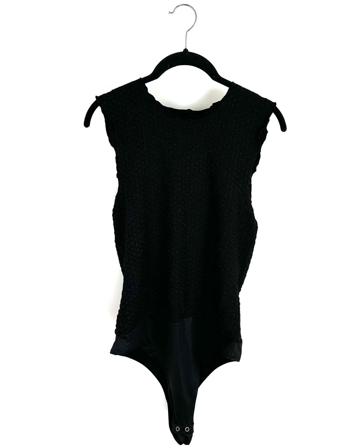Black Sleeveless Bodysuit - Size 4/6