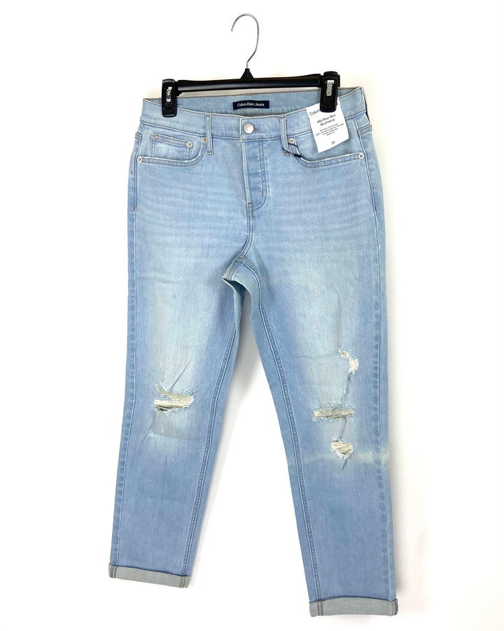 Light Wash Ripped Mid Rise Slim Boyfriend Jean - Size 27 and 28