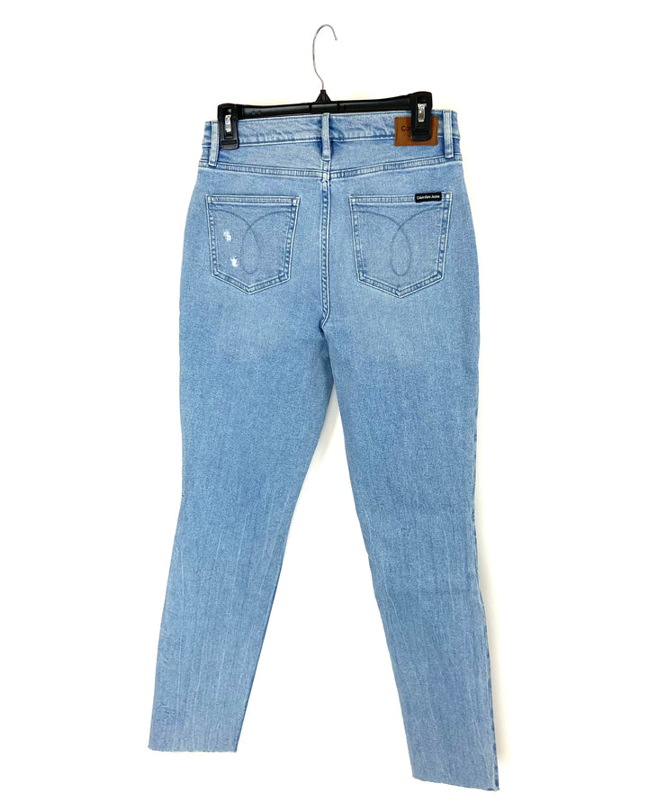 Light Wash High Rise Ripped Skinny Jean - Size 28