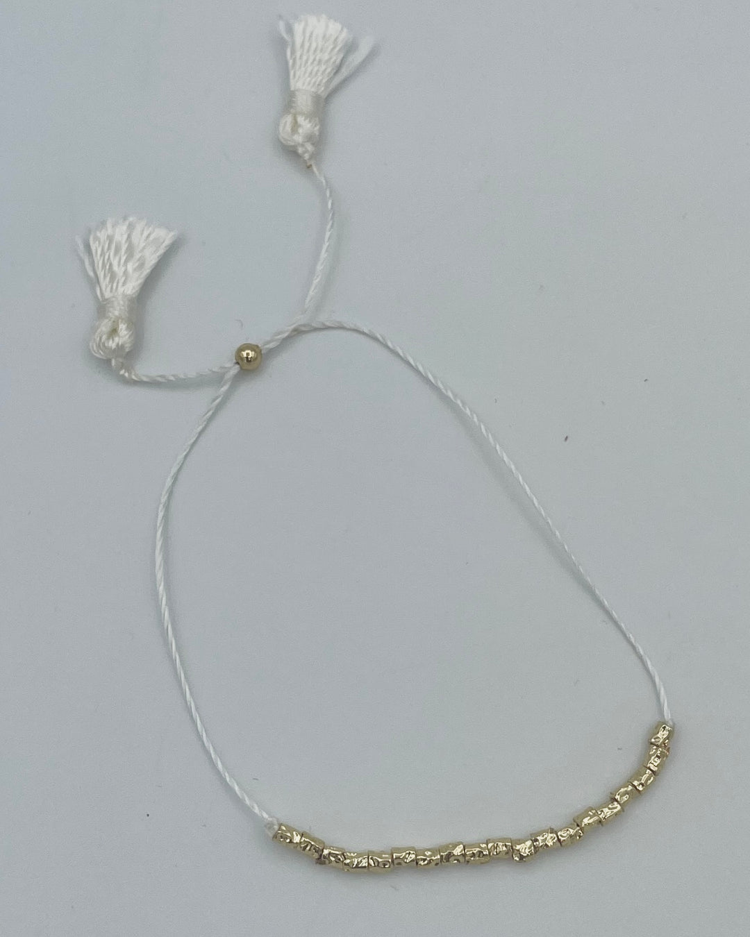 White String and Gold Beaded Bracelet