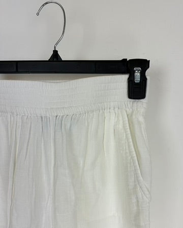 Frost White Wide Leg Trousers - Size 0/2 and 8/10