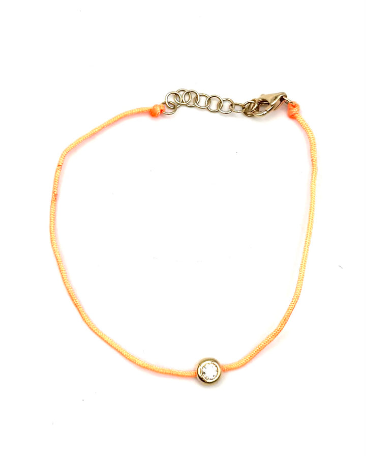 Thin Orange Bracelet With Center Rhinestone