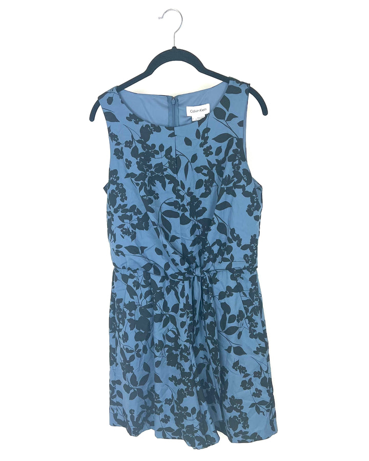 Muted Blue Romper With Black Floral Design - Size 8
