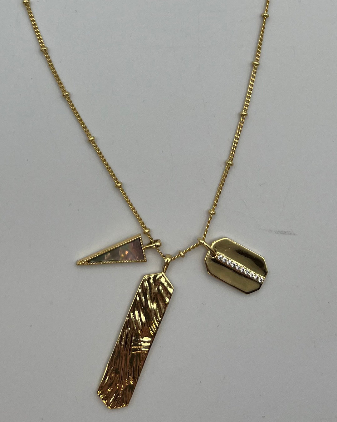Three Charm Long Gold Necklace