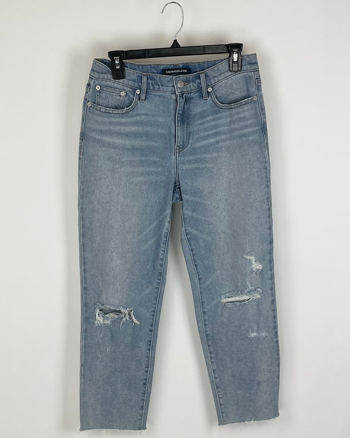 Light Wash Ripped Jeans - Size 28