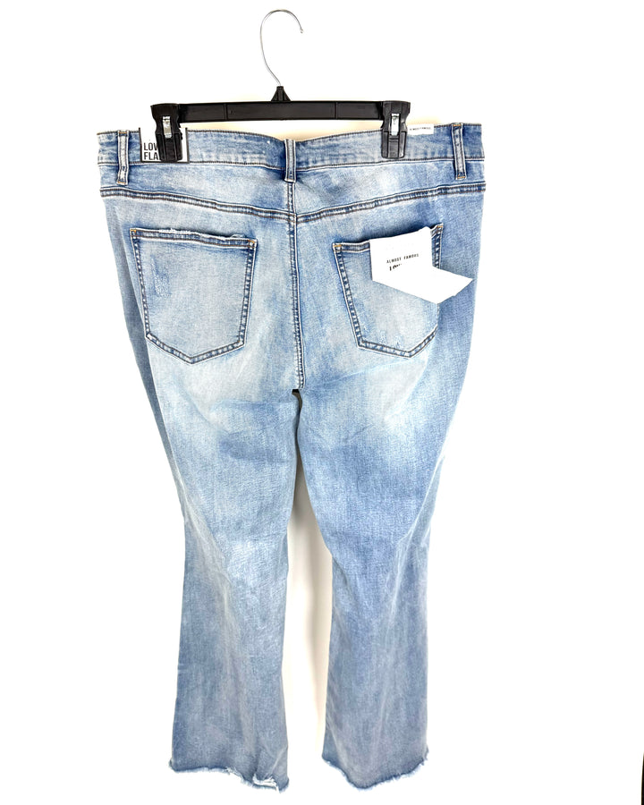 Ripped Low Rise Flare Jeans - Size 18