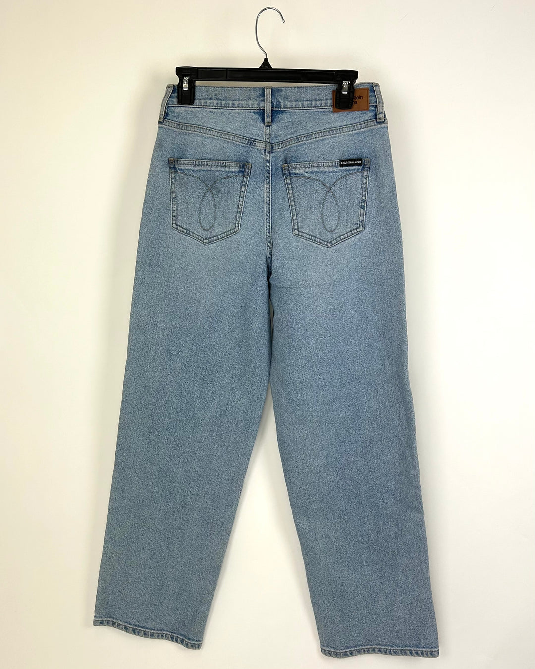 Light Wash Straight Leg Jeans - Size 28 Waist