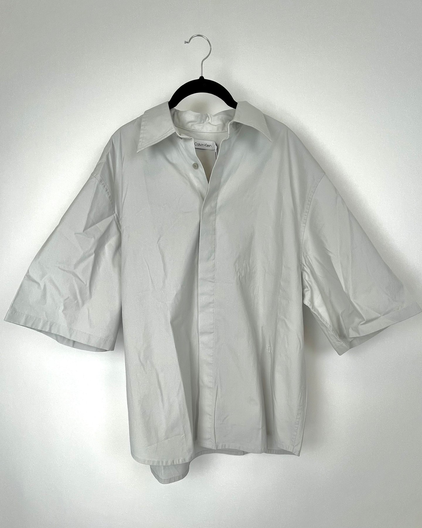 Calvin klein half sales shirt